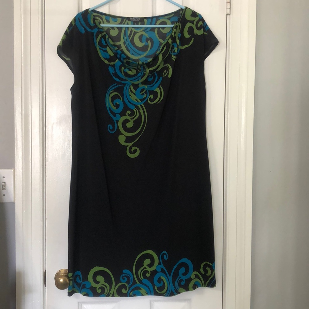 Black sheath dress with drama